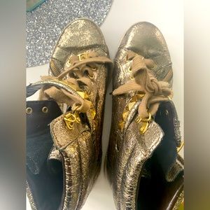 Gold Michael Kors gold foiled high top sneakers